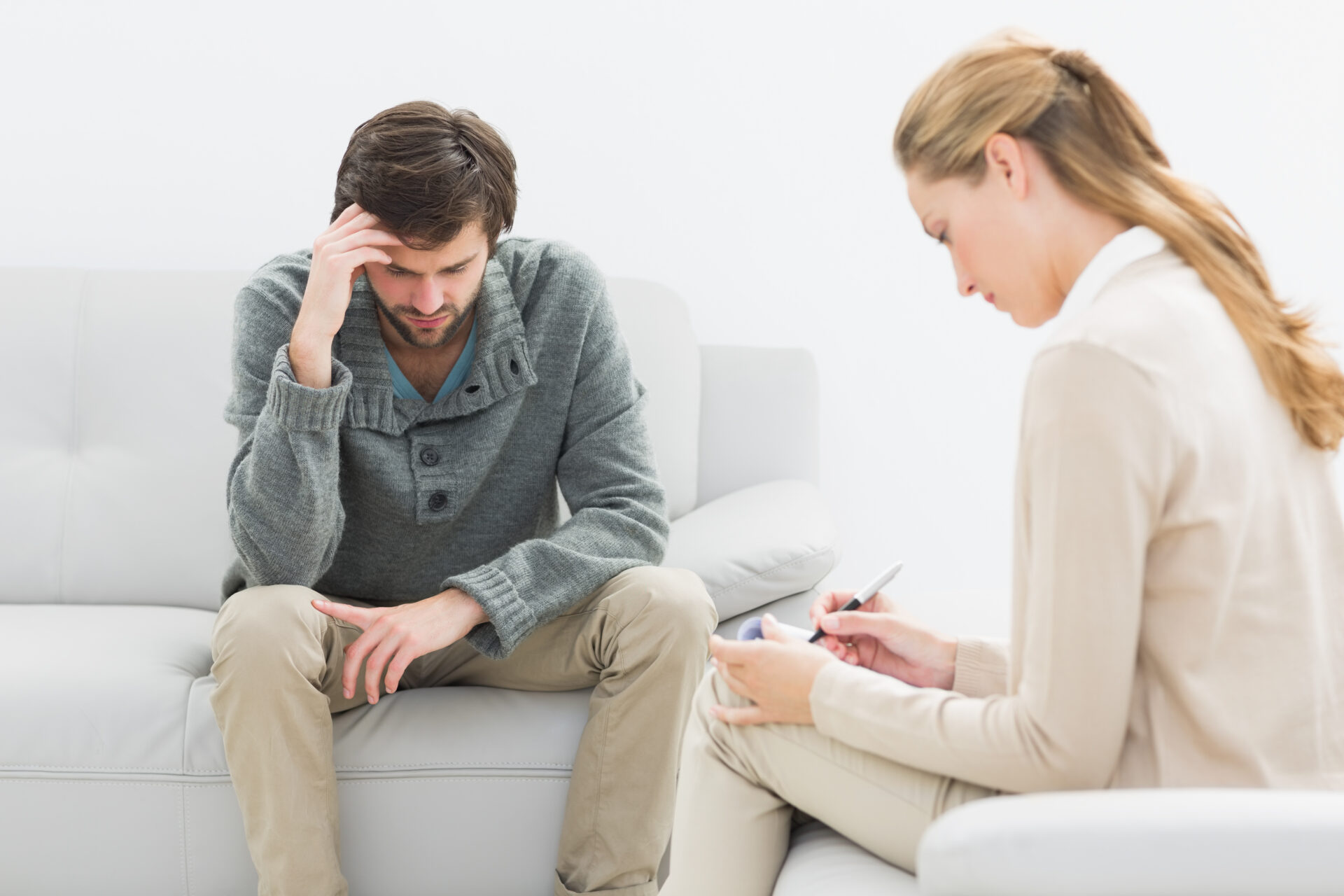 Young man in meeting with a financial adviser at home